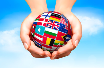 Wall Mural - Flags of the world in globe and hand. Vector illustration.