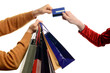 © luanateutzi - Man hand holding shopping bags,woman giving him a credit card.