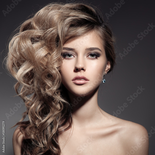 Fototapeta do kuchni Beautiful Blond Woman. Curly Long Hair