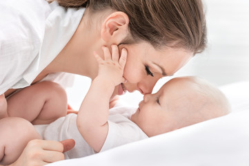 portrait of happy mother and baby