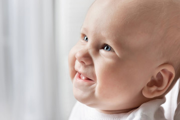 Wall Mural - Portrait of a happy young child