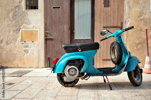 Naklejka - mata magnetyczna na lodówkę Vintage italian scooter Vespa on old medieval street