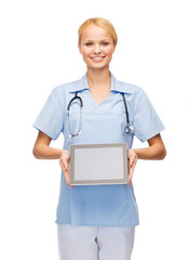 Poster - smiling female doctor or nurse with tablet pc