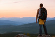 © Rock and Wasp - guy in the mountains at sunset. the concept of freedom