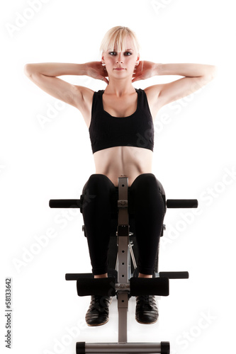 Fotografia, Obraz sports girl doing exercises on a press