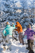 © CandyBox Images - Snowball fight winter friends having fun