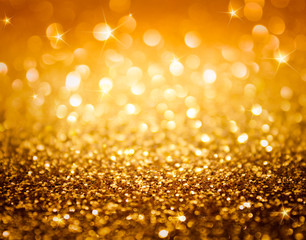 golden glitter and stars for christmas background