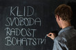 © jurra8 - man writes on a blackboard