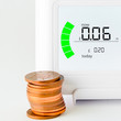 House energy meter showing the cost per hour for electricity usa