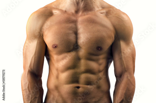 Fotomural Close up on perfect abs. Strong bodybuilder with six pack