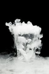 Wall Mural - glass of water with ice vapor