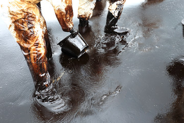 clean up Crude oil stain