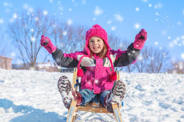 Emotional girl in winter clothes