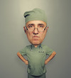 © ArtFamily - bighead angry doctor in glasses