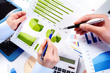 Aufkleber - Hands of business people with calculator.