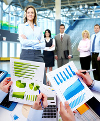 Aufkleber - Business people working with graphs.