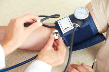 Wall Mural - Blood pressure measuring.