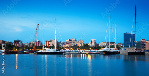 Fotoboard na płycie W godzinach wieczornych port vell i barceloneta