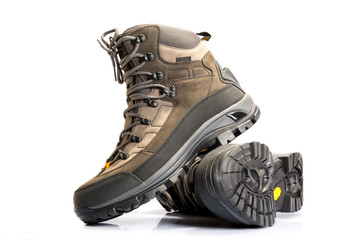 a pair of new hiking boots on white background