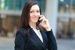 © Minerva Studio - Businesswoman talking at the phone