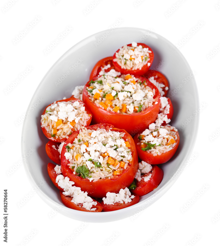 Stuffed tomatoes in bowl isolated on white