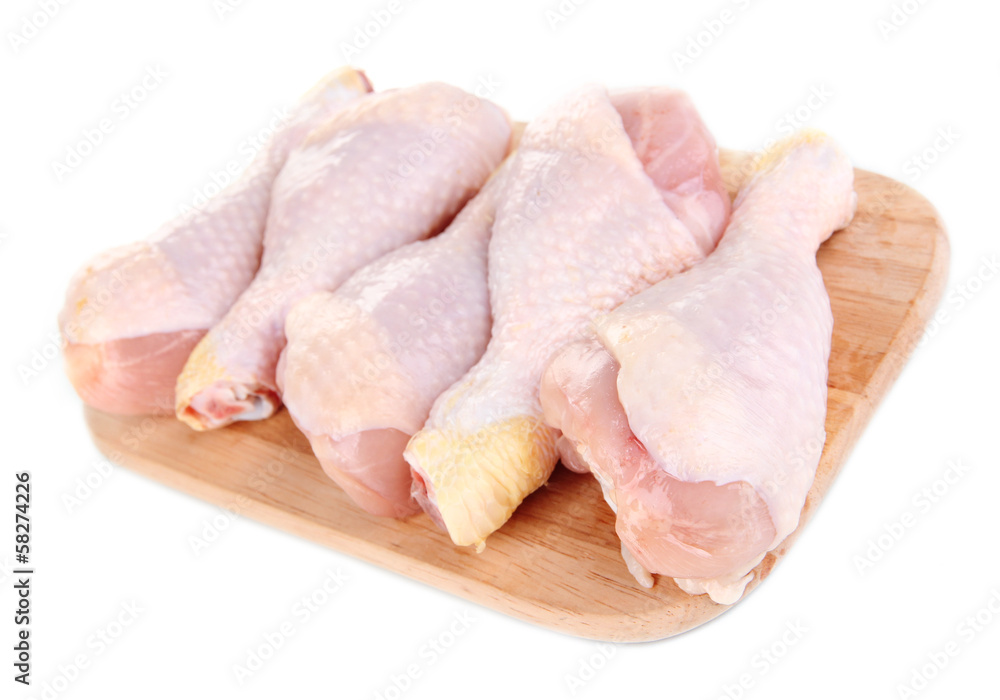 Raw chicken legs isolated on white