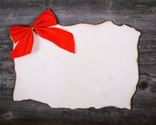 Christmas Decoration And Vintage Paper On Wooden Background