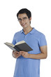 © imagedb.com - Portrait of a man reading a book and smiling