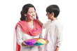 © imagedb.com - Woman celebrating Holi festival with her son