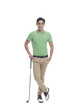 © imagedb.com - Male golfer standing with a golf club and smiling