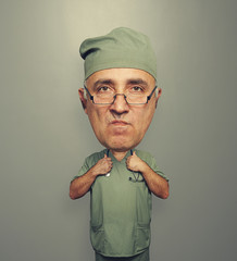 Fototapete - funny dissatisfied bighead doctor