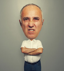 Fototapete - funny picture of angry senior man