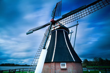 Dutch Windmill Over Blurred Sky