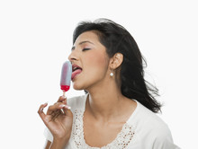 Woman Licking An Ice Cream