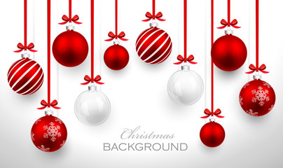 christmas balls with red ribbon and bows