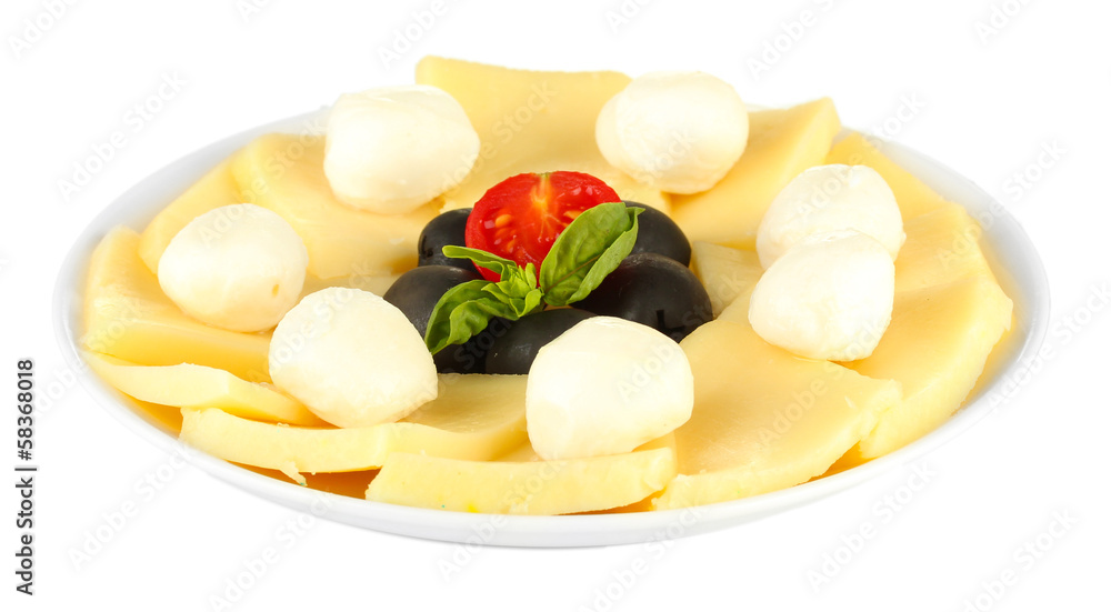sliced mozzarella cheese with vegetables in the plate isolated