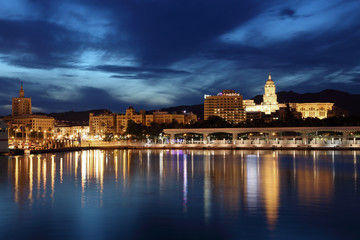 Fototapete - City of Malaga illuminated at dusk. Andalusia, Spain