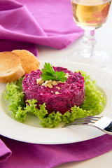 Wall Mural - A salad of beets and nuts. Selective focus.