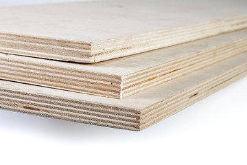 three light plywood boards stacked