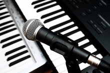 Microphone And Piano Keyboards