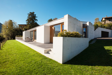 Wall Mural - Beautiful modern house in cement, view from the garden