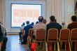 © elen31 - people sitting at the business conference