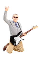 Sticker - Cool senior man with an electric guitar giving a hand sign