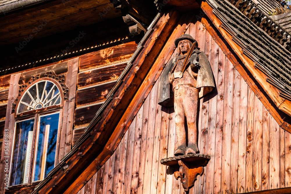 Obraz na płótnie Traditional polish wooden hut from Zakopane, Poland. w salonie