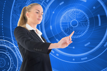 Wall Mural - Composite image of businesswoman pointing somewhere