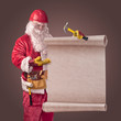 Santa Claus worker in helmet with scroll