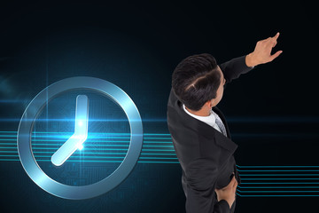 Poster - Composite image of asian businessman pointing