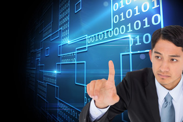Poster - Composite image of unsmiling asian businessman pointing
