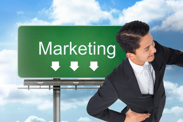 Poster - Composite image of smiling asian businessman pointing
