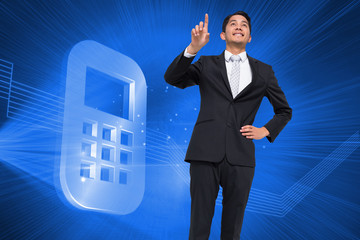 Poster - Composite image of smiling asian businessman pointing